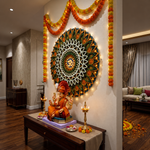 A decorated home interior with a large circular mandala wall hanging, orange marigold garlands, and a seated Ganesha statue on a wooden table with lit candles. image 5