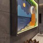 A framed 3D LED wall art piece featuring a seated golden Buddha figure against a stylized night sky with clouds, trees, and a moon, mounted on a dark gray textured wall. image 7